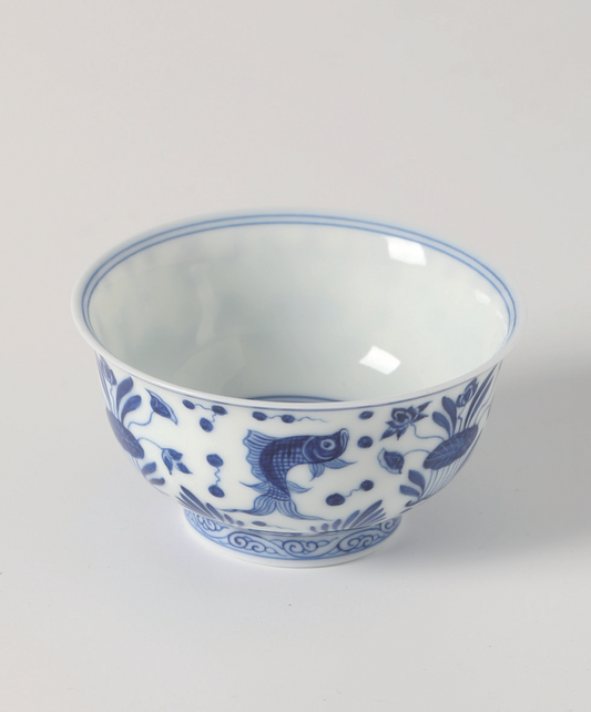 Jingdezhen Porcelain a Blue And White Cup With Designs Of Interlocking Flowers, Fish And Algae